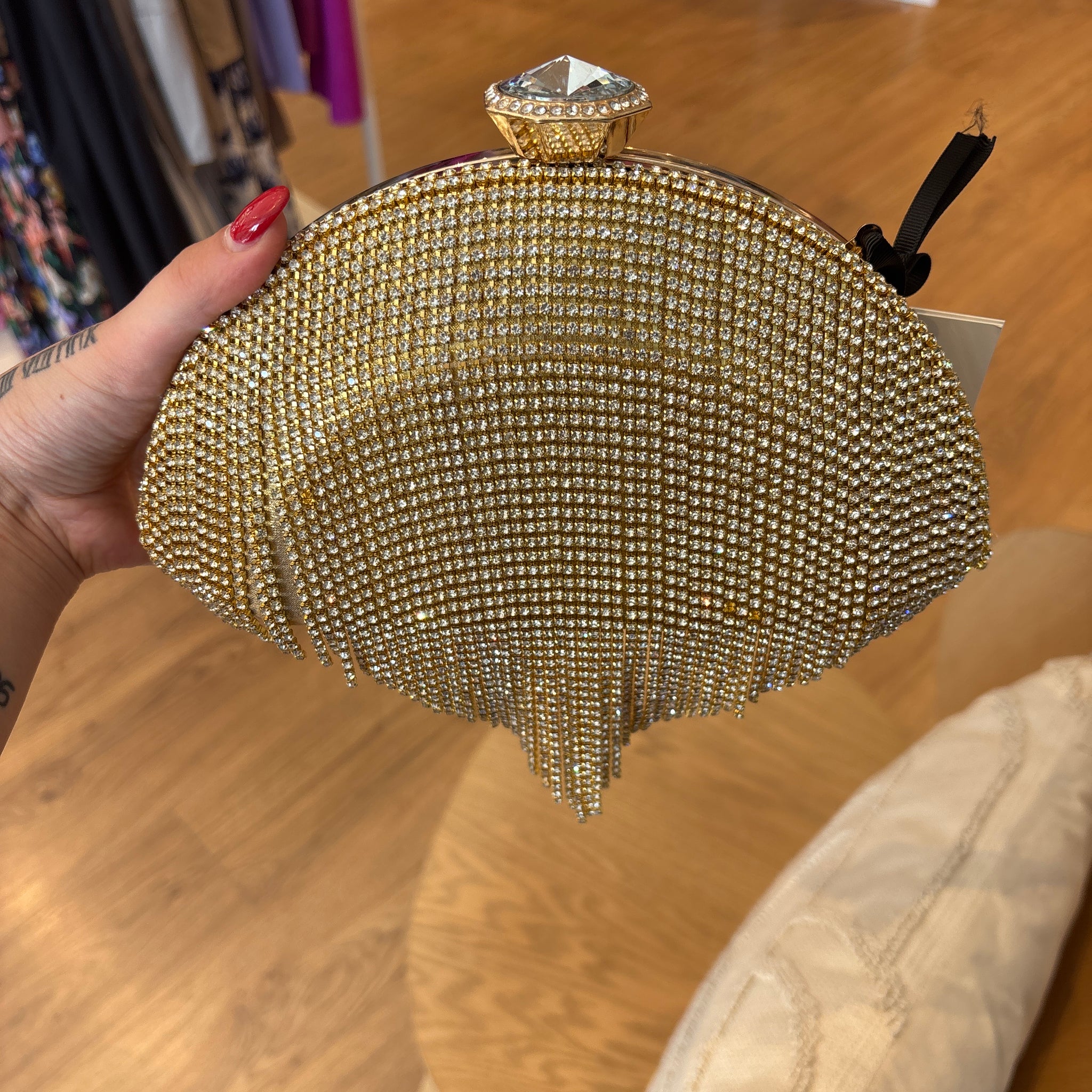 Pochette cascata di brillantini